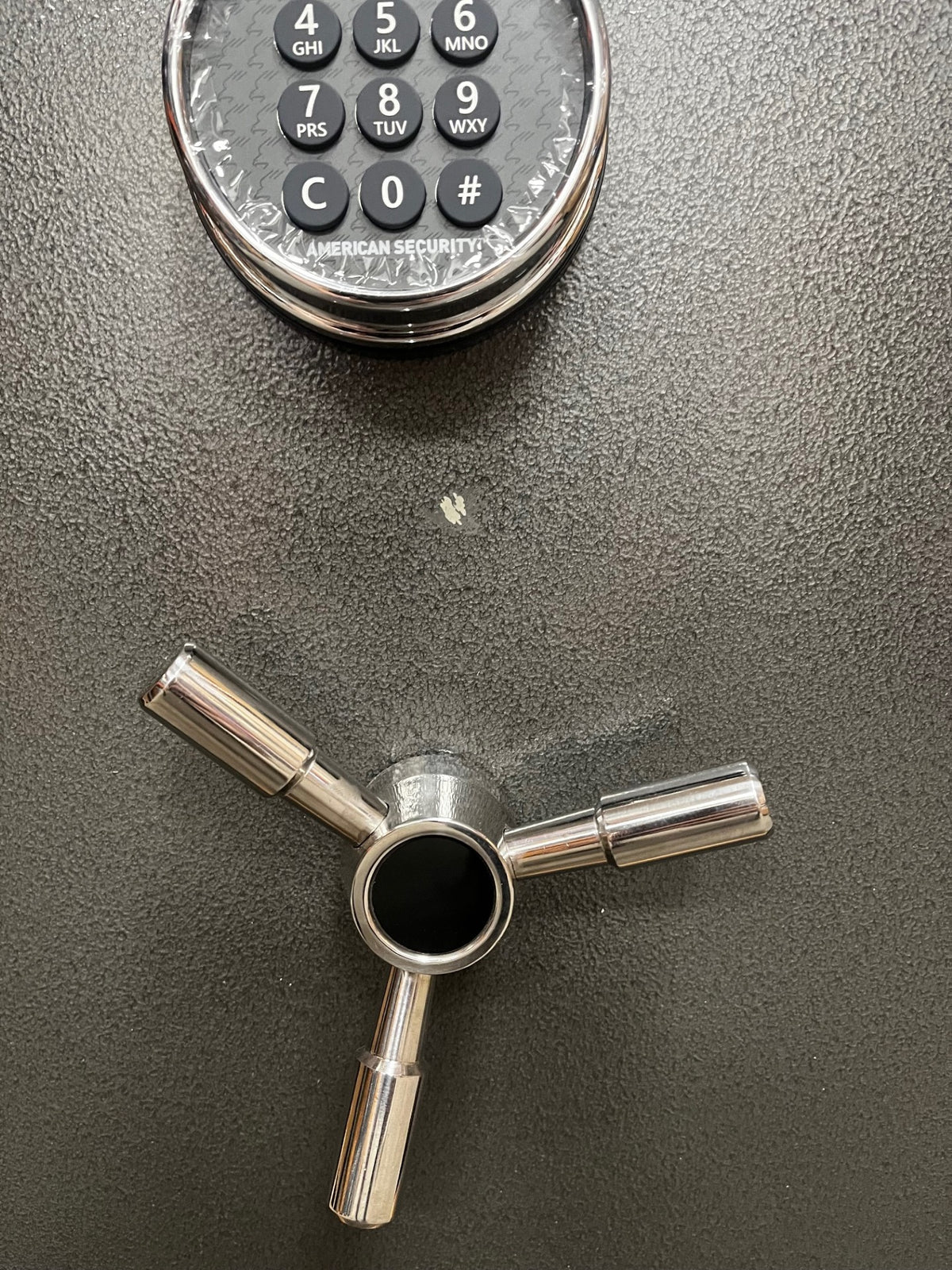 Close-up view of the scratch on the front door. 