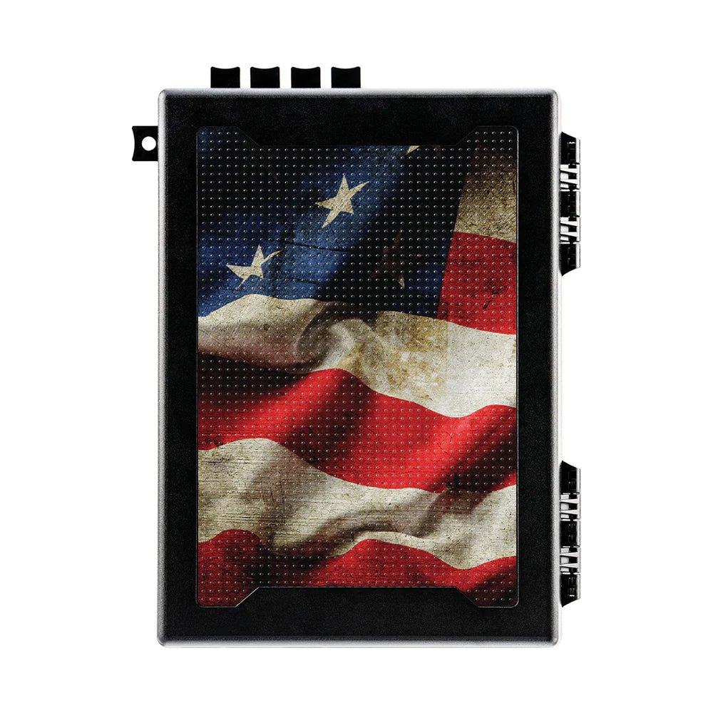 Stopbox Pro Independence Day Flag Edition portable pistol box closed, commemorative American flag graphic on lid