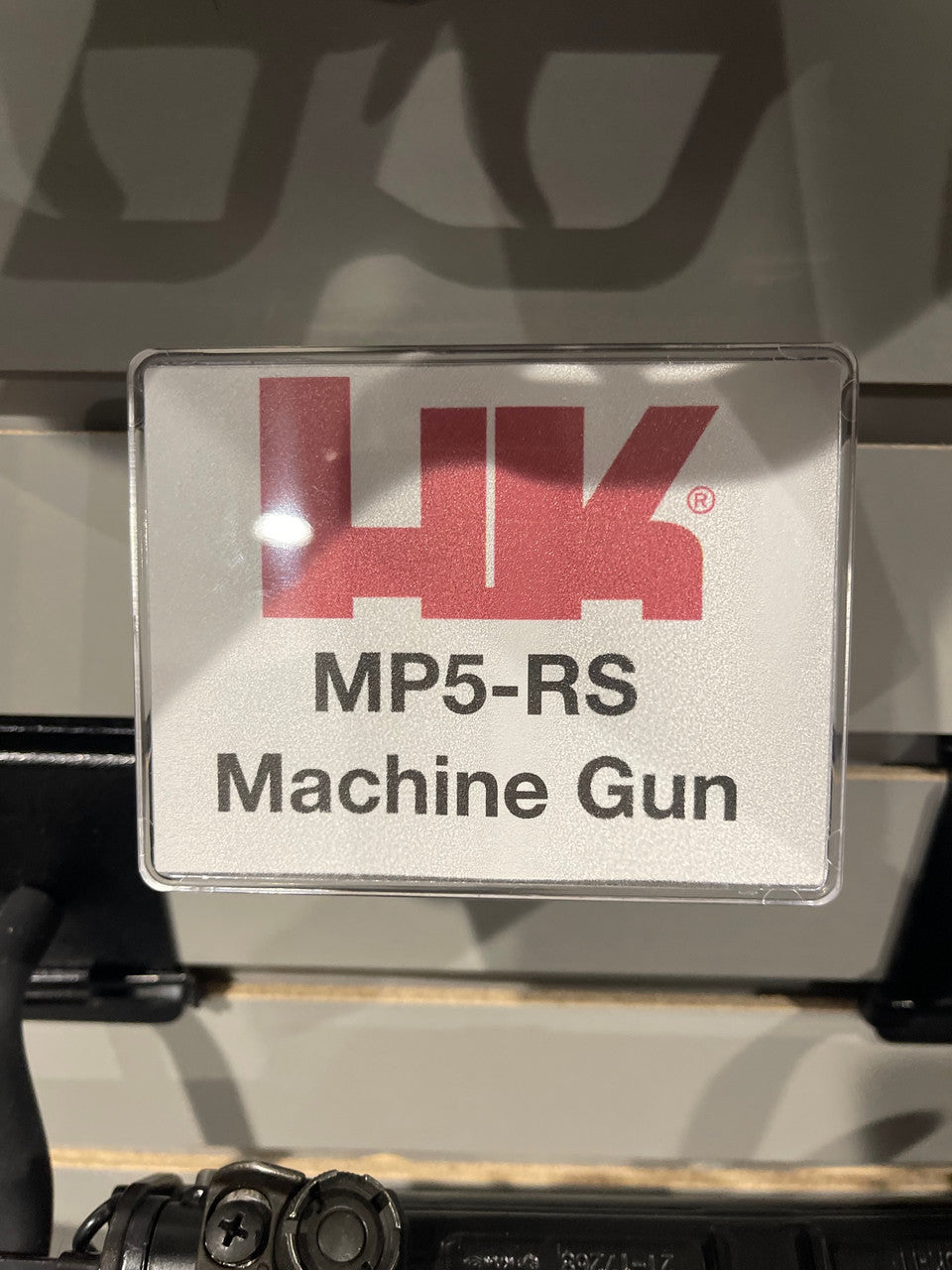 HK MP5-RS Machine Gun label on a reflective surface