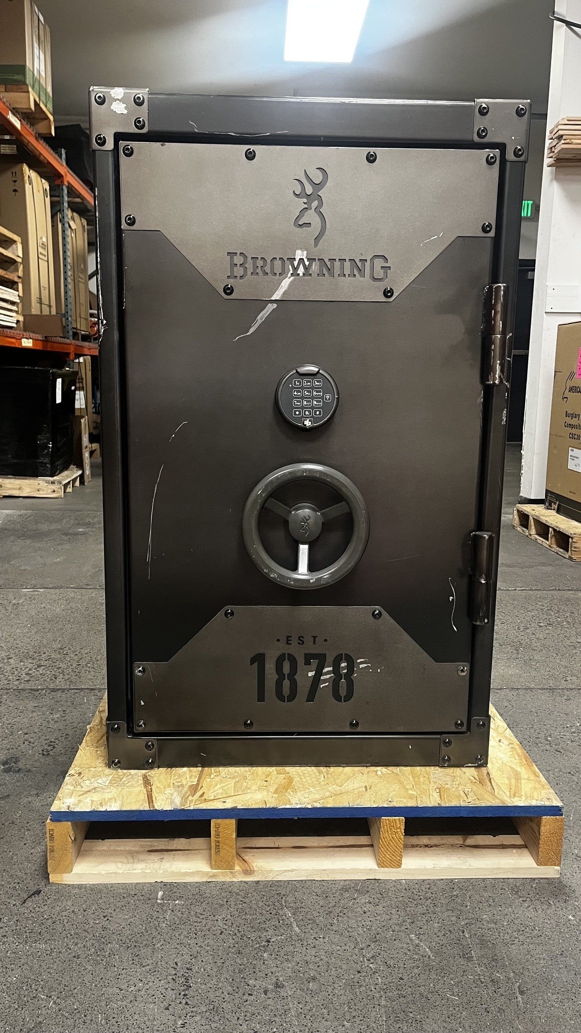 Front view of the safe. The front is full of scratches. It comes with a S&G top lit digital lock. 