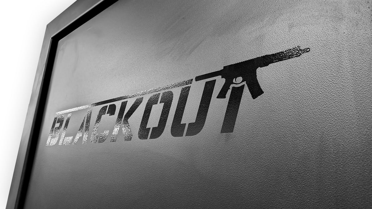 Black 'BLACKOUT' logo on a Vulcan Vault Door