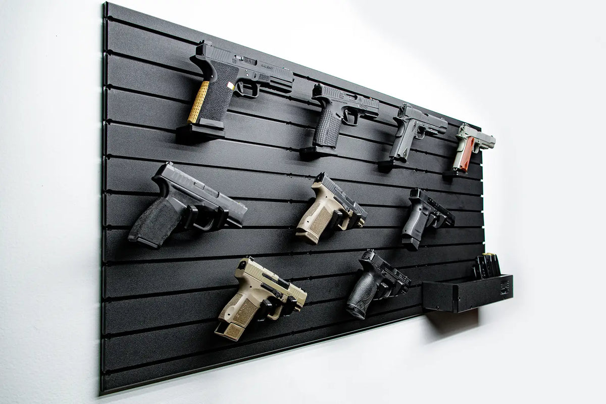 Black gun rack with various firearms on a white background