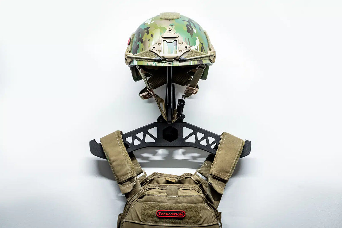 Tactical helmet and vest on a white background
