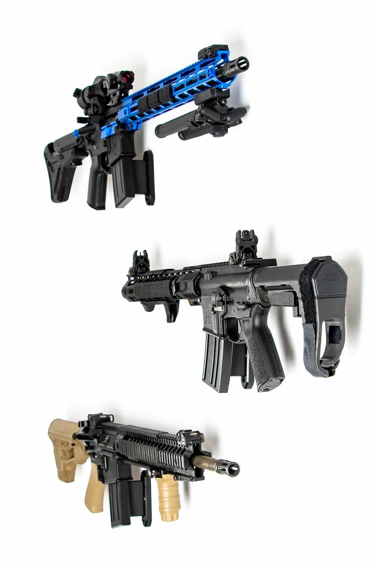 Three guns with different designs on a white background