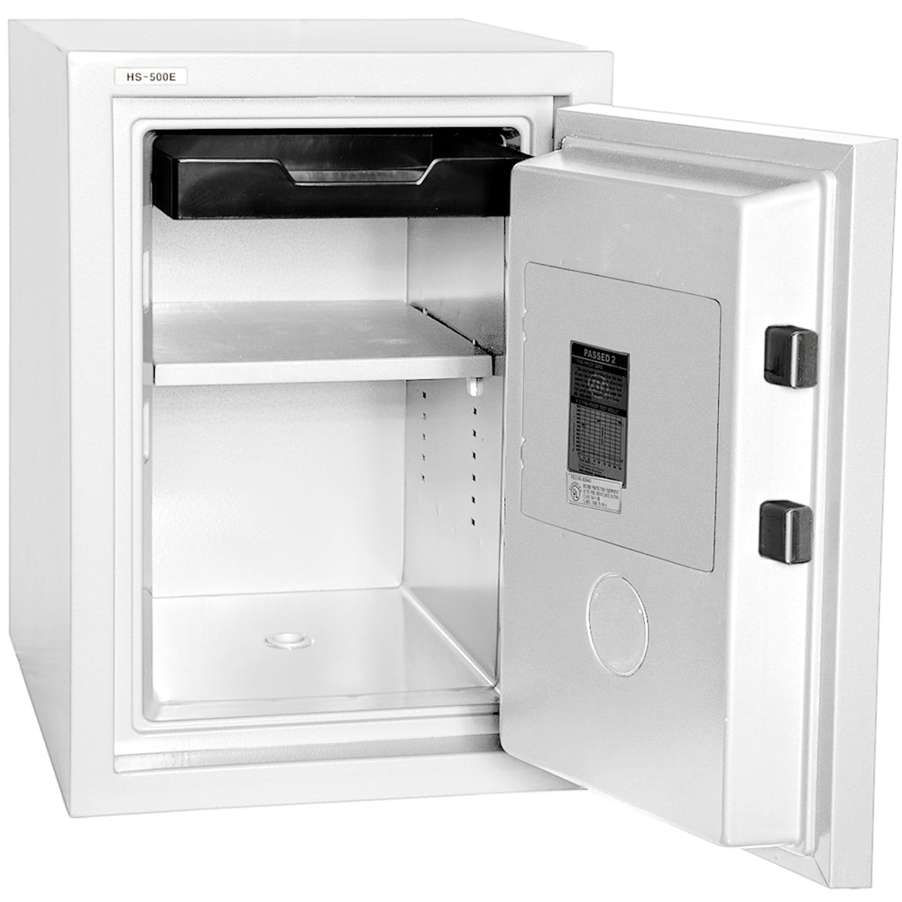 Hollon HS-500 fireproof home safe in white with door open showing tall upright interior with built-in top drawer, adjustable shelf, two square locking bolts on door edge, and Hollon fire test certification label on inside of door
