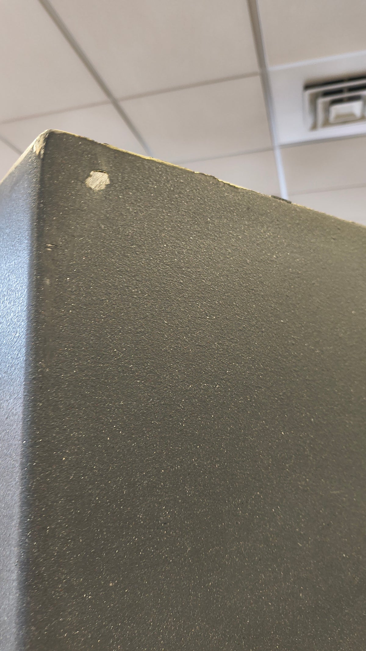 Blemished Browning HTR49T back top left corner with scuffing and paint chipping. 