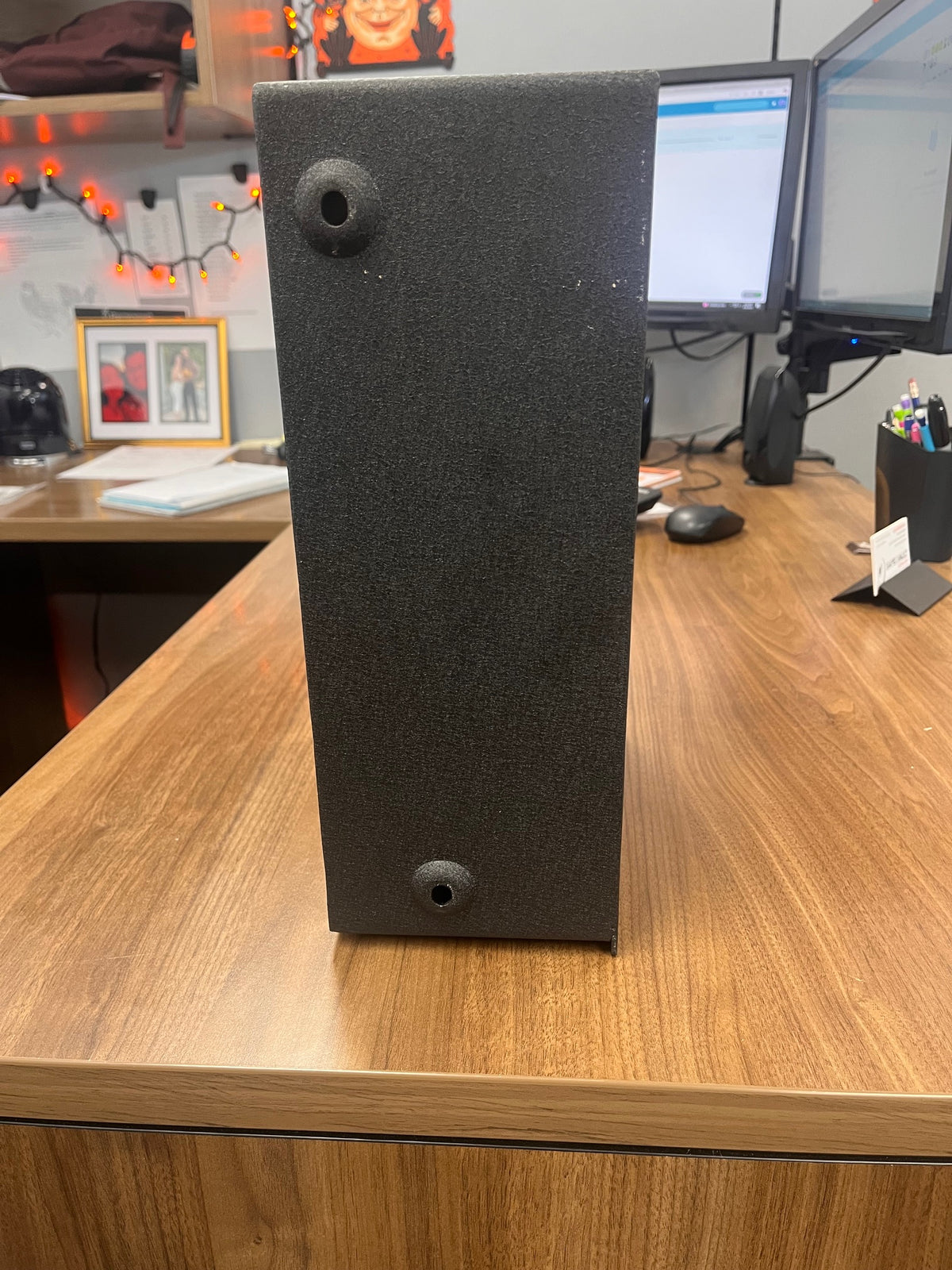 Back view of the safe, it has a small amount of white paint on the edge. 