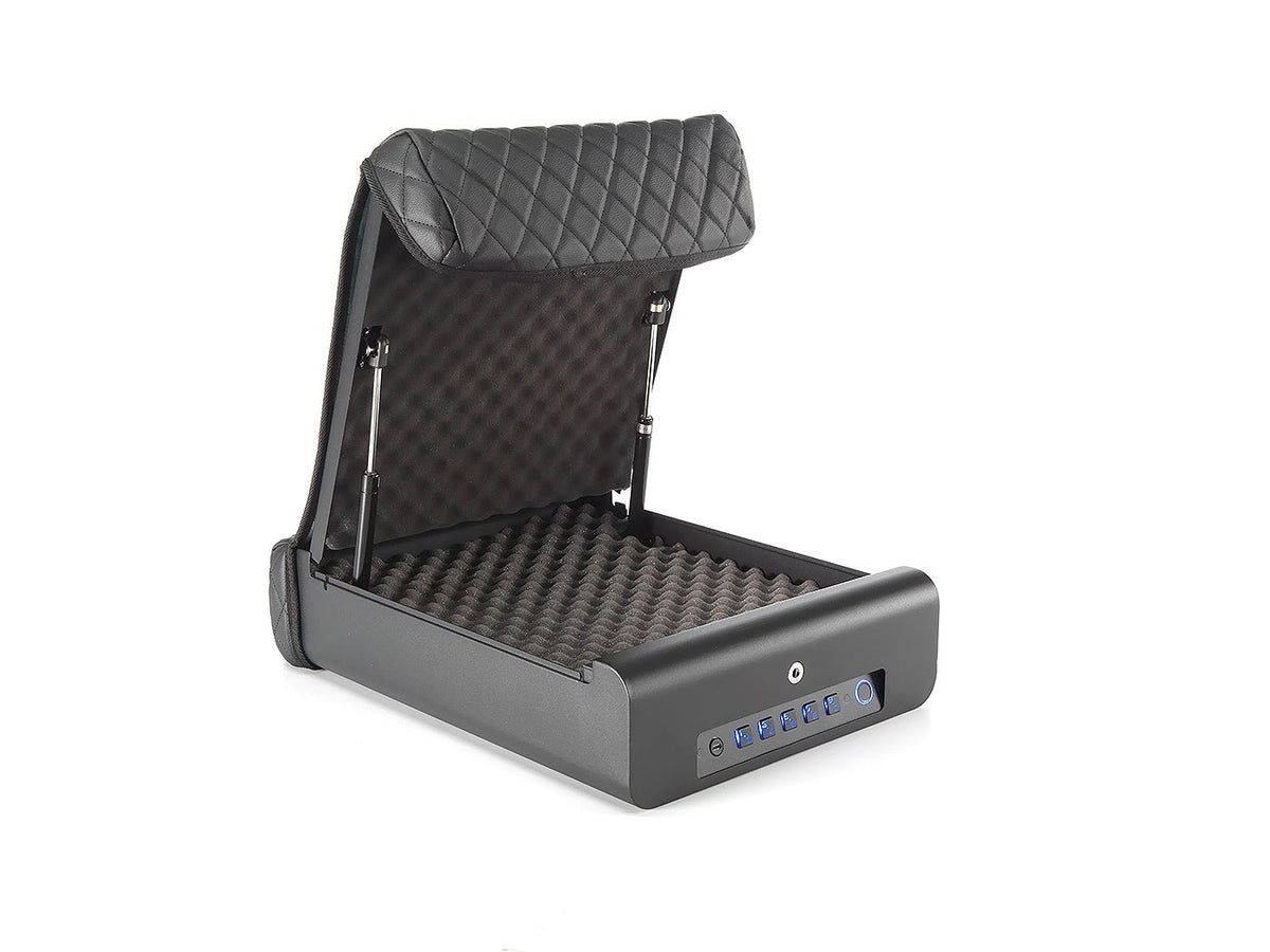 BoostedSafe Elite Vehicle Gun Safe open side-angle view on white background showing booster seat cover folded back, egg-crate foam interior, gas hinge struts, and front panel with blue-lit keypad and fingerprint scanner