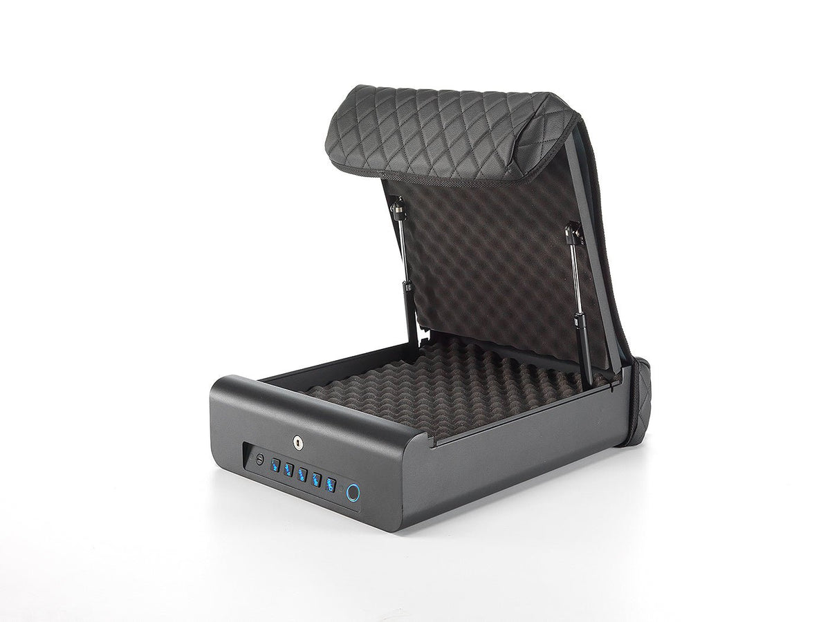 BoostedSafe Elite Vehicle Gun Safe open angled view on white background with egg-crate foam insert in base, diamond-quilted booster seat cover folded back, gas struts visible, and blue-lit front panel