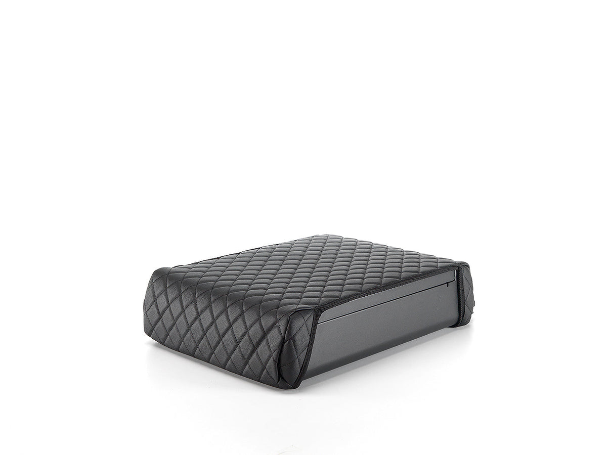 Black quilted safe on a white background
