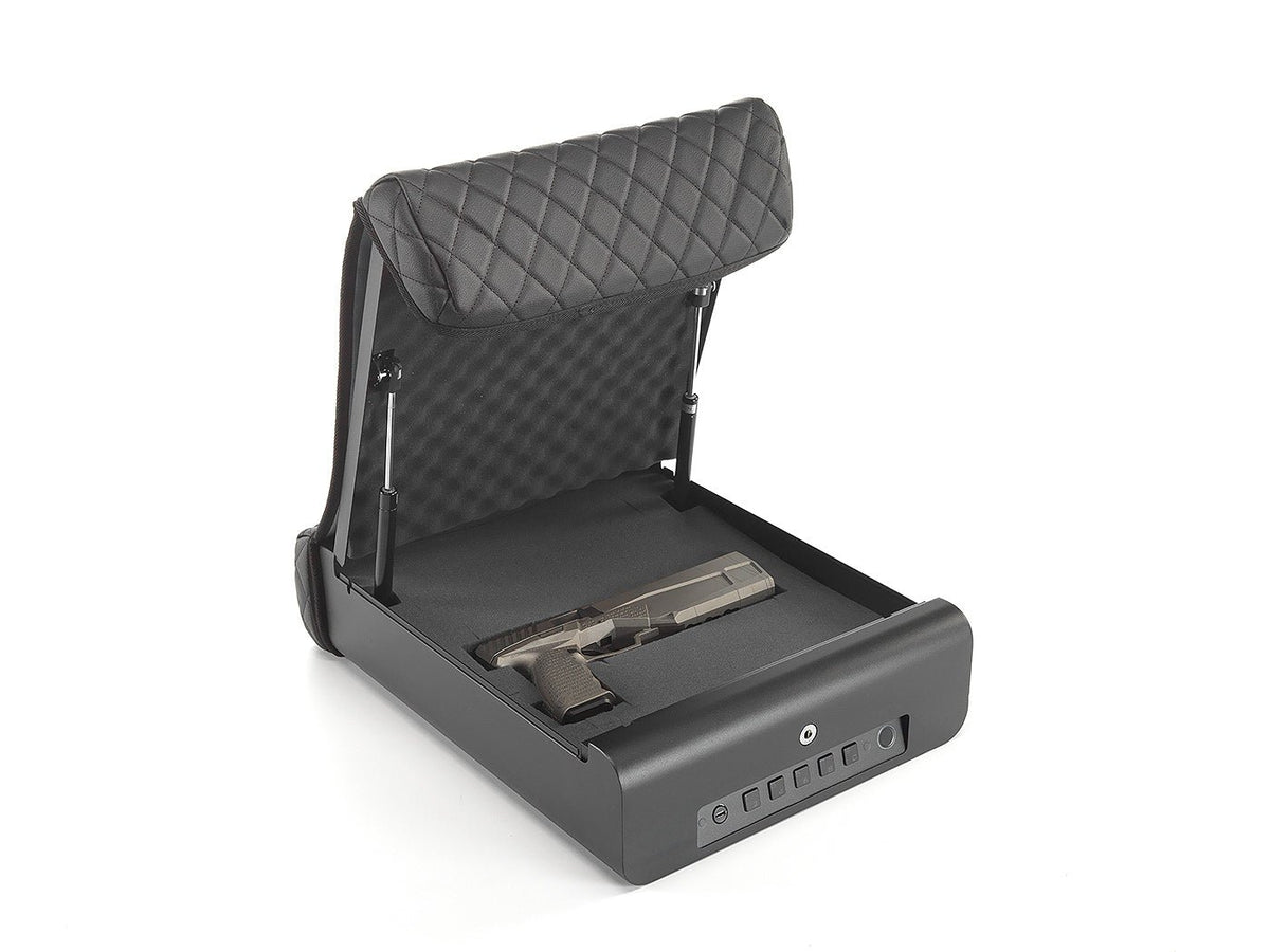 BoostedSafe Elite Vehicle Gun Safe open on white background with handgun stored inside, side-angle view showing diamond-quilted booster seat cover folded back and gas hinge struts