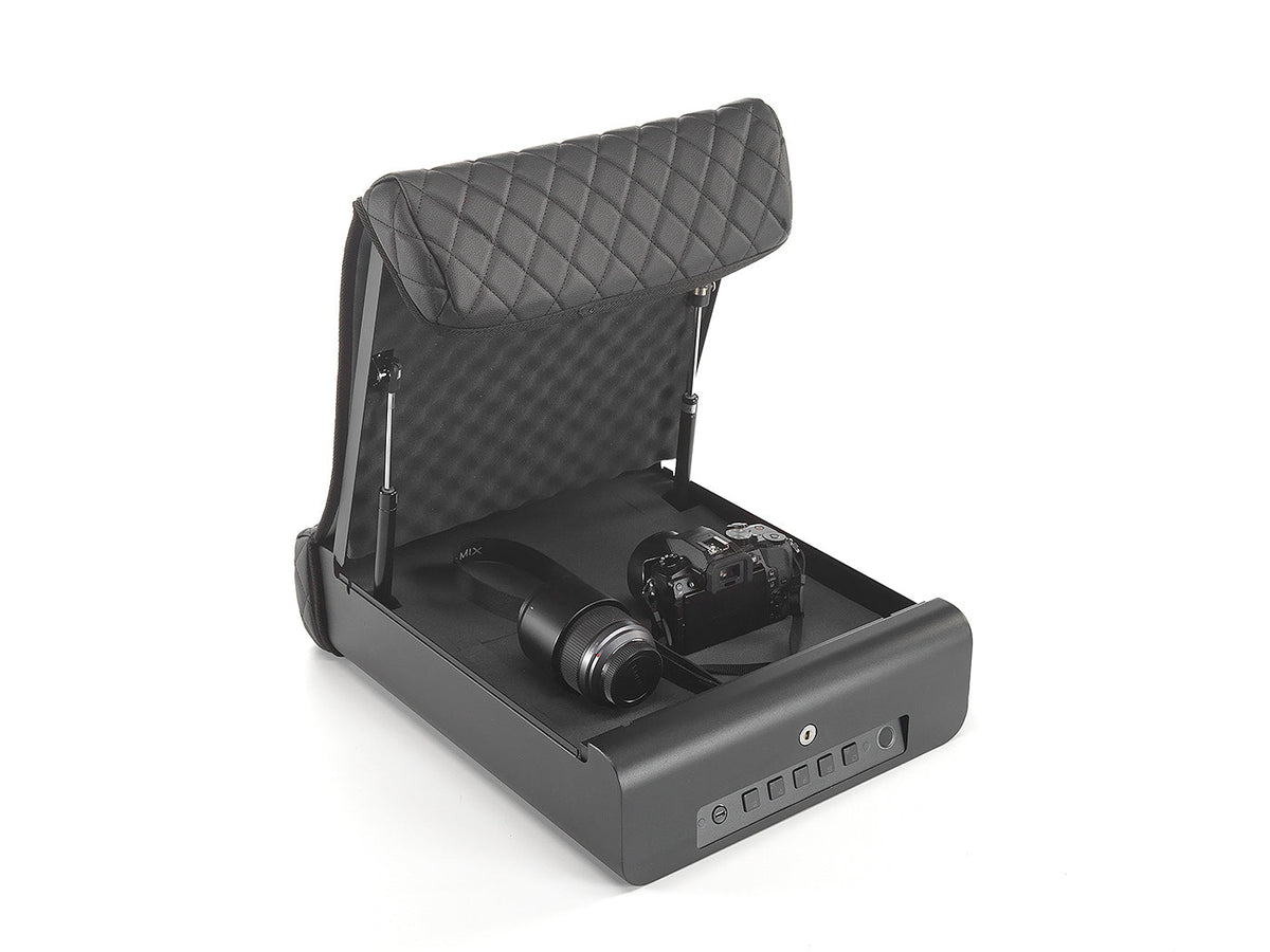 BoostedSafe Elite Vehicle Gun Safe open on white background with a DSLR camera and lens stored inside, demonstrating versatile secure storage for valuables beyond firearms