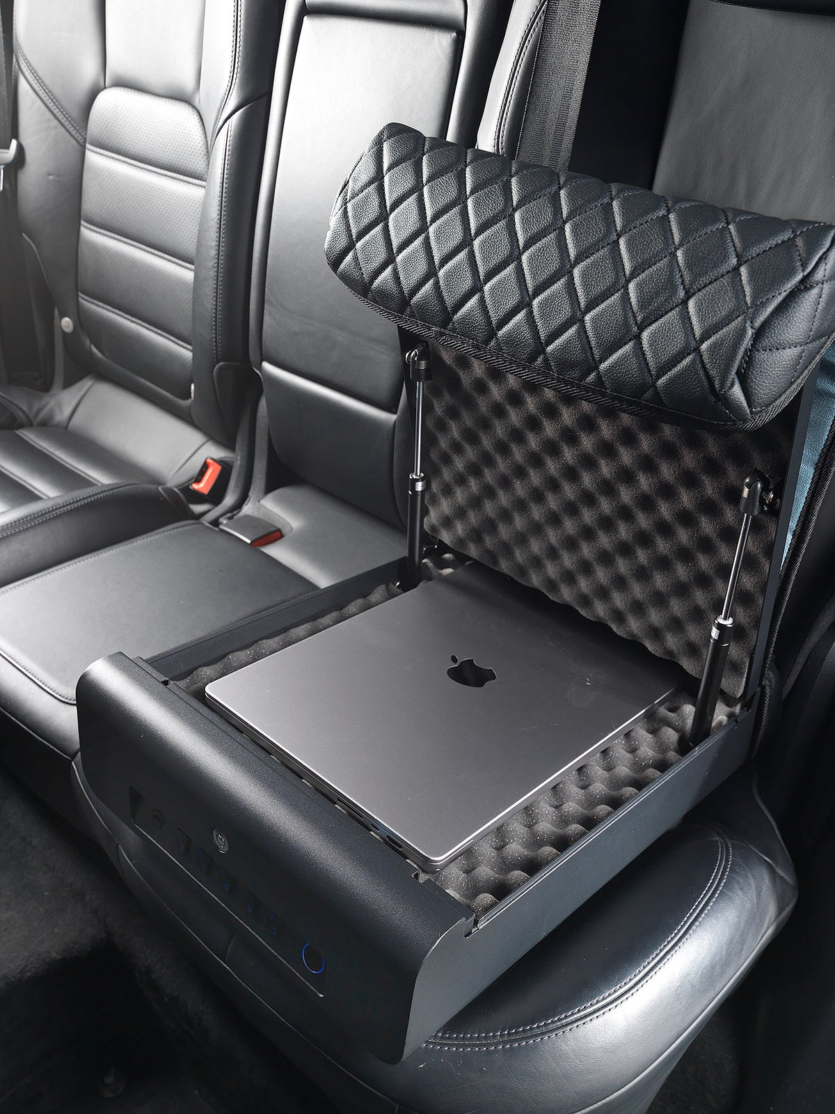 Car seat organizer with a laptop on a gray car seat