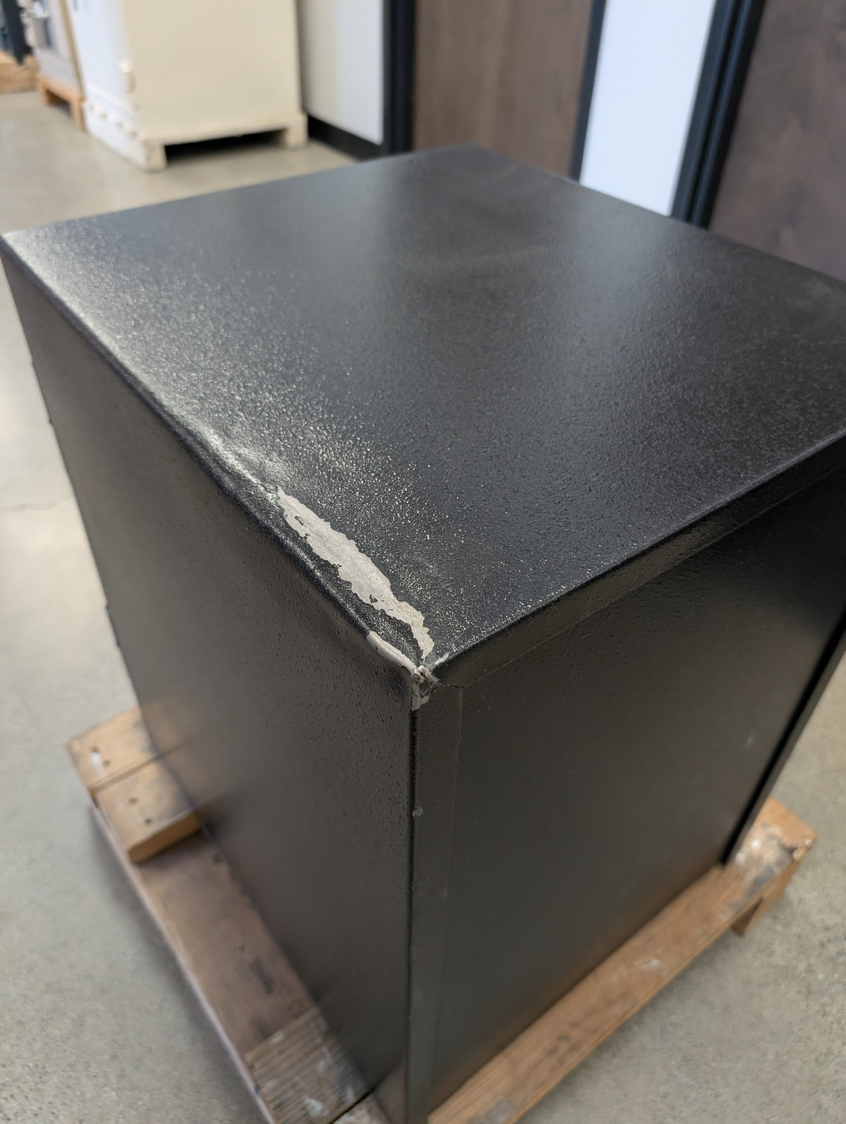 Back top view of the bump, scratch and chipped paint. 