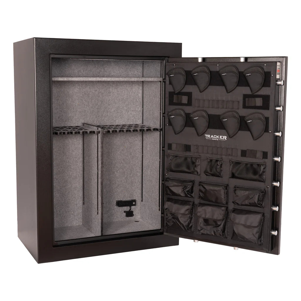 Open view of the Tracker M64 gun safe showing internal shelving and heavy-duty door construction.