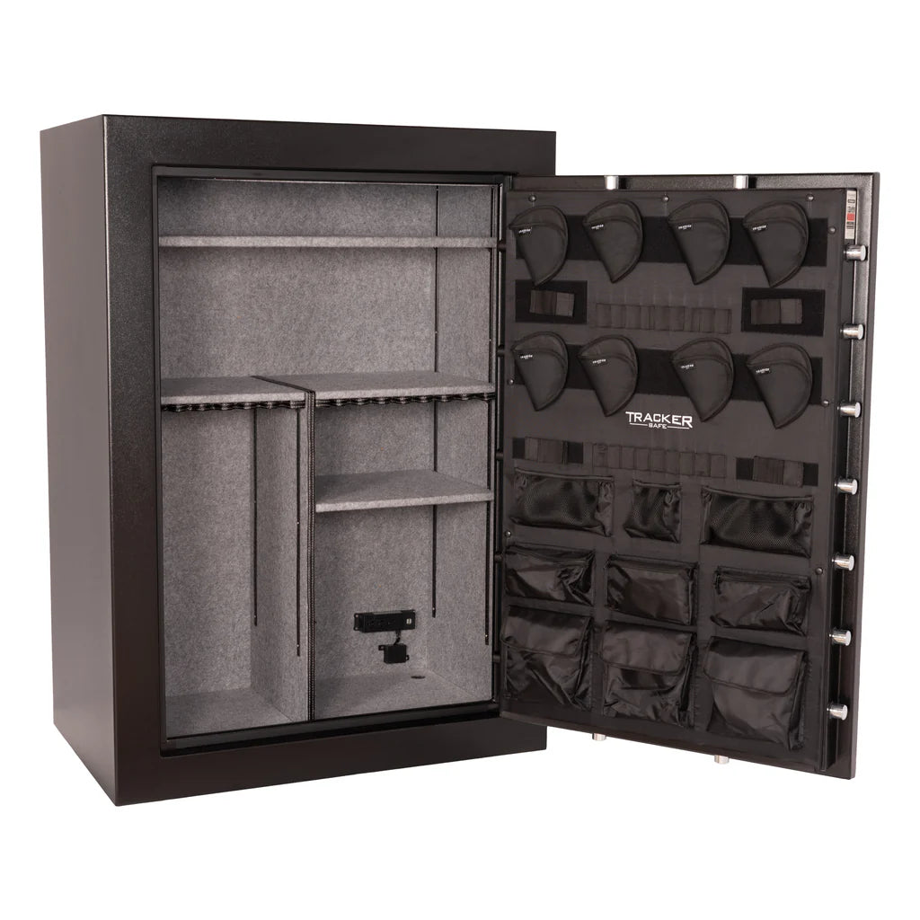 Angled open view of the Tracker M64 Safe highlighting the gray carpeted interior and multiple shelving units.