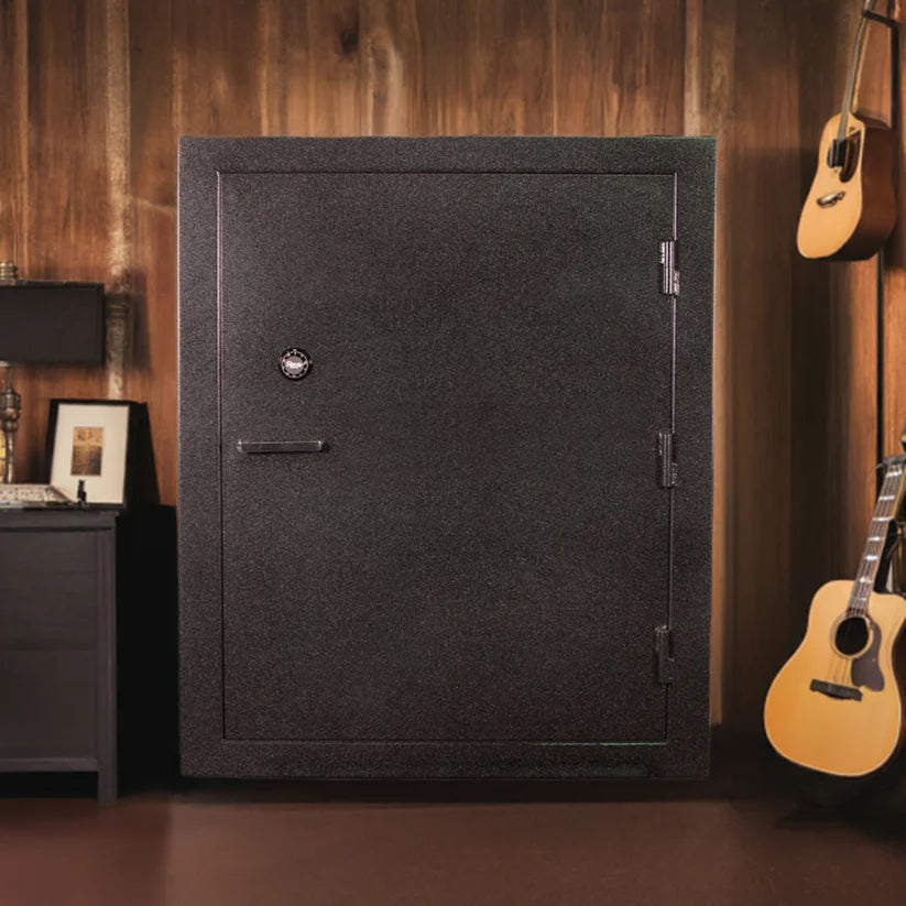 Sturdy Safe Model 6028-6 Gun Safe 72"Hx60"Wx27"D Heavy Steel Construction in room with guitars on wall