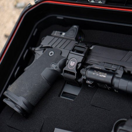 Vaultek XE-SK Range Kit quick-release strap securing a tactical handgun with weapon light inside a LifePod XE