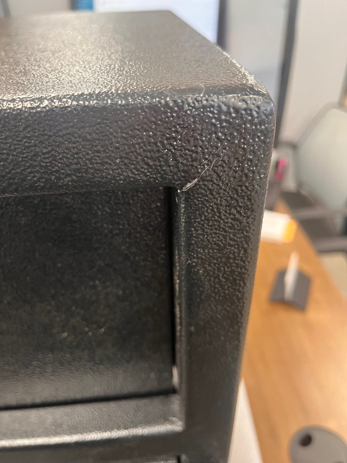 Small chip on the paint on the top inner right corner. 