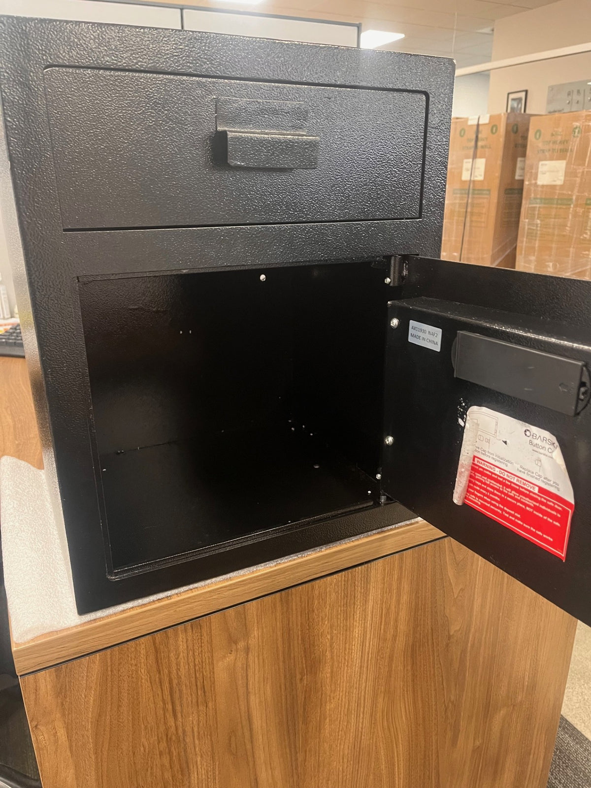 Front view of the safe with the door open. 