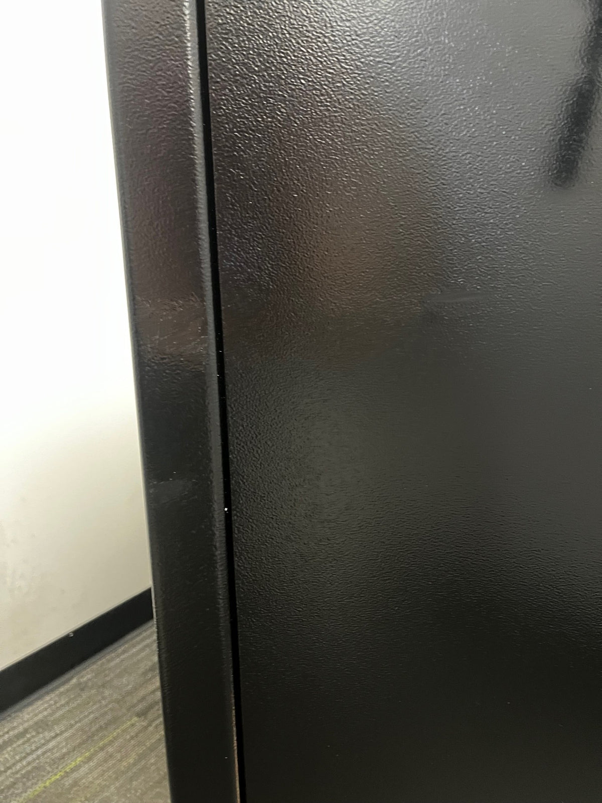 The front middle area has a small scratch which was painted over with. 