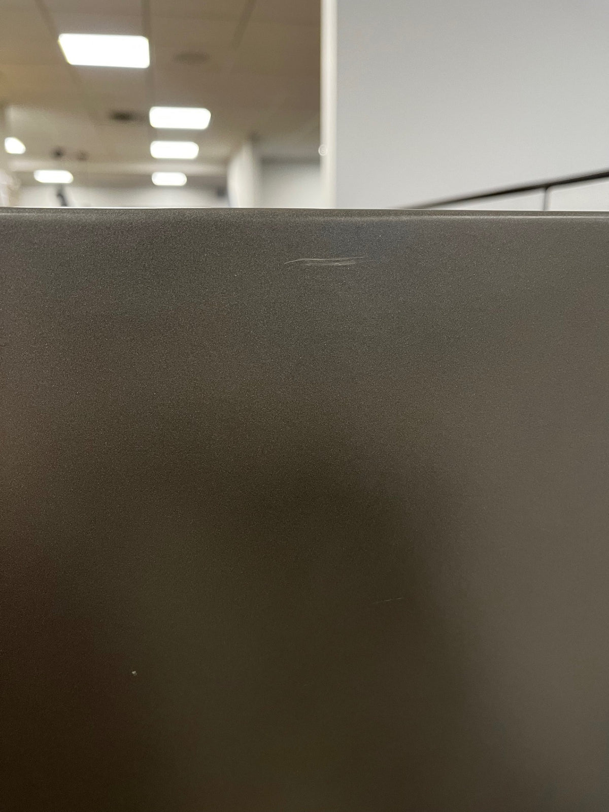 Small scratch on the top area of the right side of the safe. 