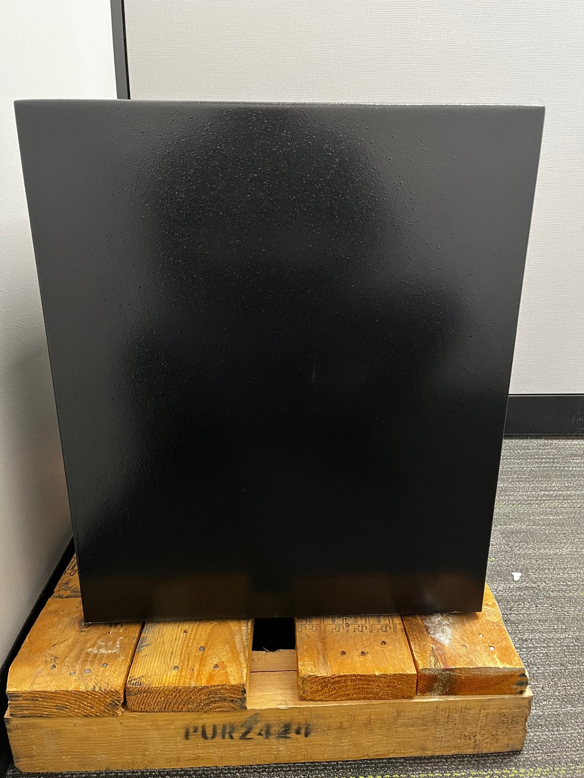 Left side vide of the safe. It has some small scratches on the bottom edge of the safe. 