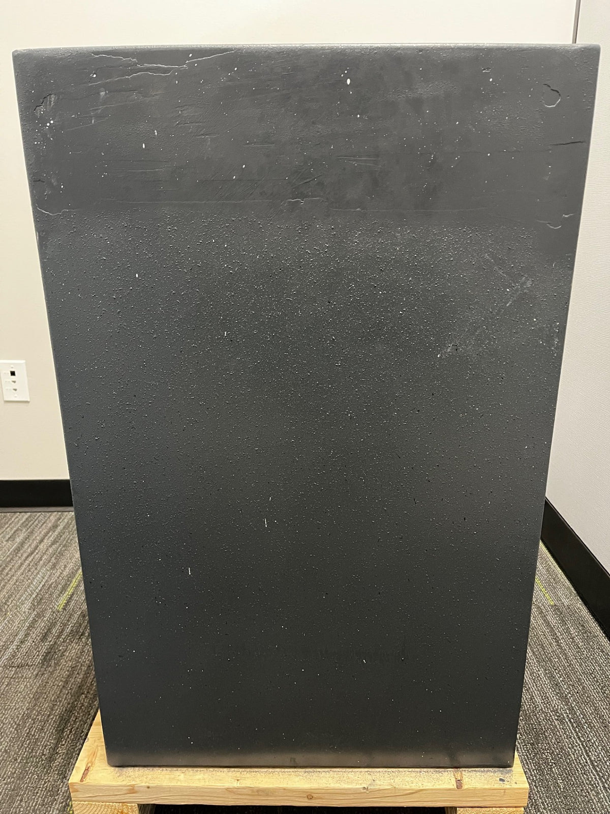 Back side view of the safe. The top back has been painted over and it has a few scratches. 