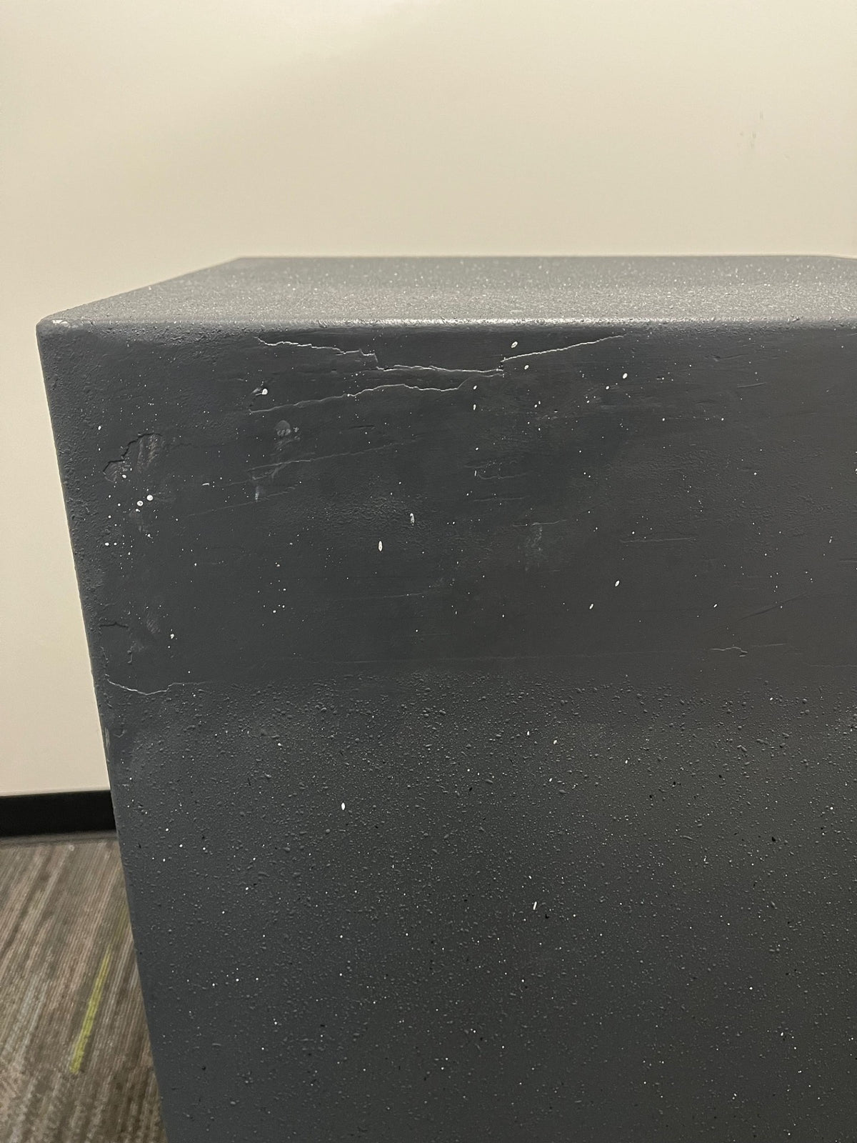 Close-up of some of the scratches on the top back of the safe. 