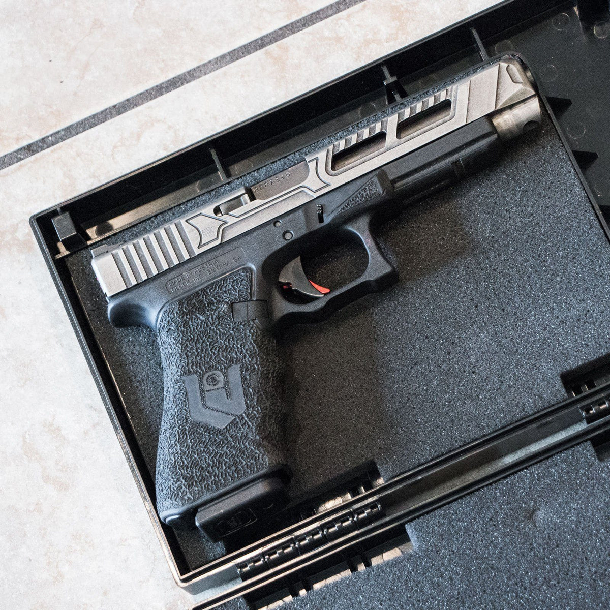 StopBox Portable Instant-Access Pistol Box Closeup of Handgun